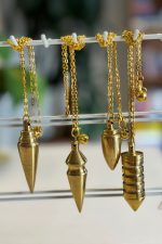 PENDULOS EN BRONCE CON TESTIGO